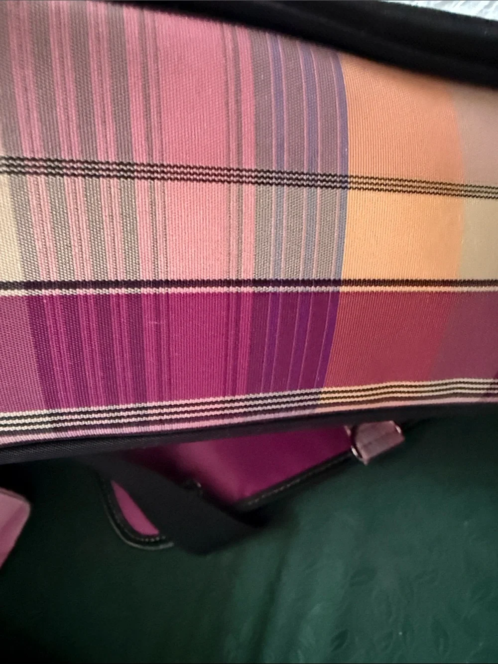 Very gently used Targus Laptop/ Messenger Bag. Pink plaid design.
